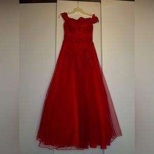 I am selling my long red prom dress. I only worn it once